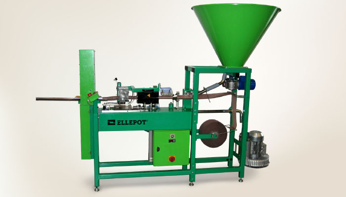 Ellepot's semi-automatic machines produce paper pots by wrapping growing media in degradable Ellepot paper Model H211